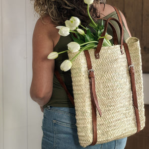 Woven Backpack with leather strap.