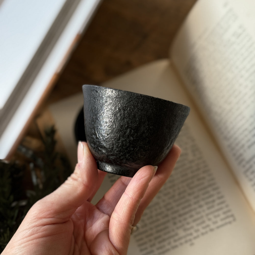 Vintage small black bowl cups.