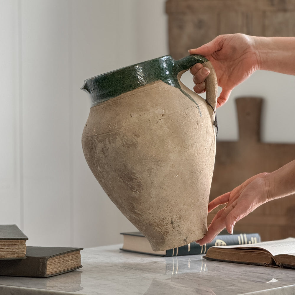Vintage medium green olive jar.