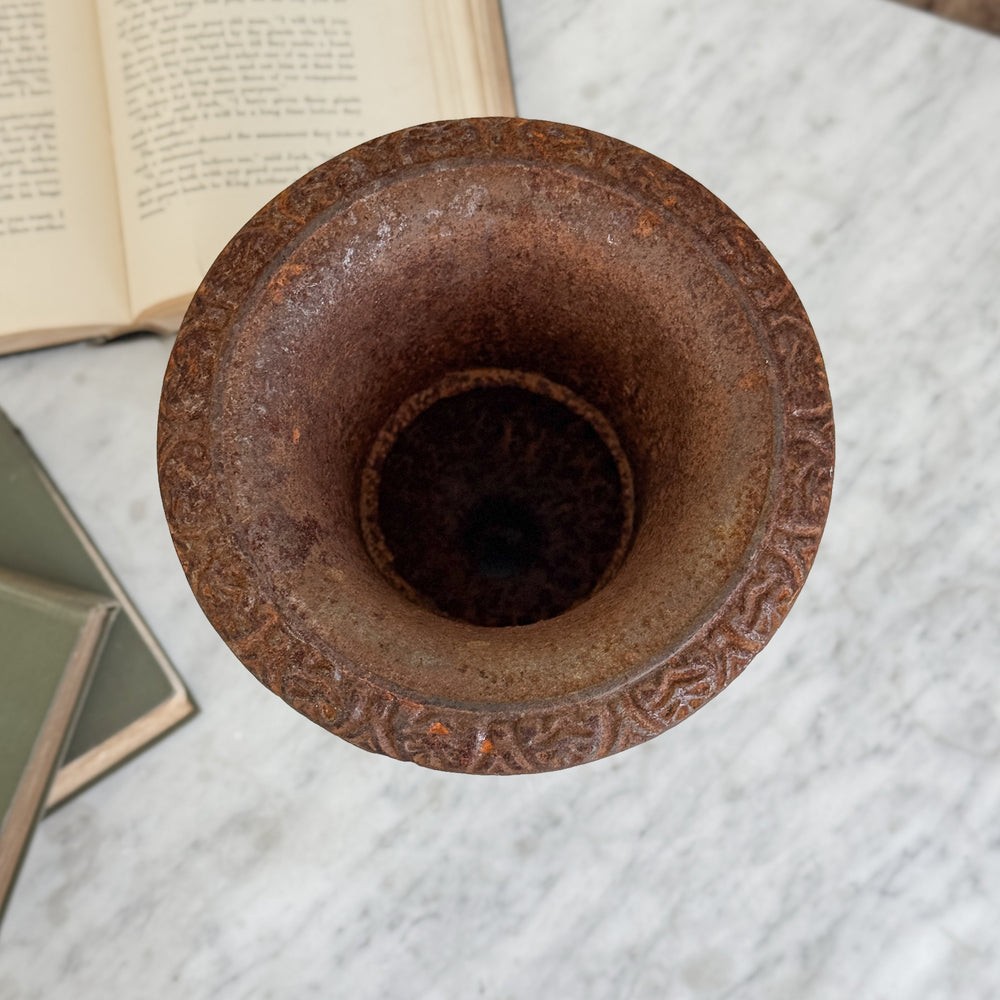 Vintage cast iron flower urn.