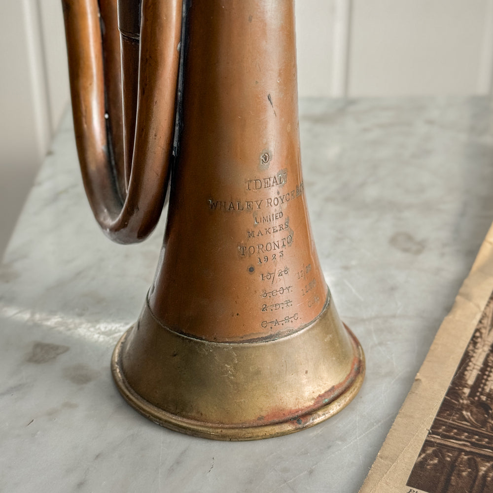 Antique copper bugle.