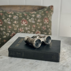 Vintage bird embossed opera glasses.