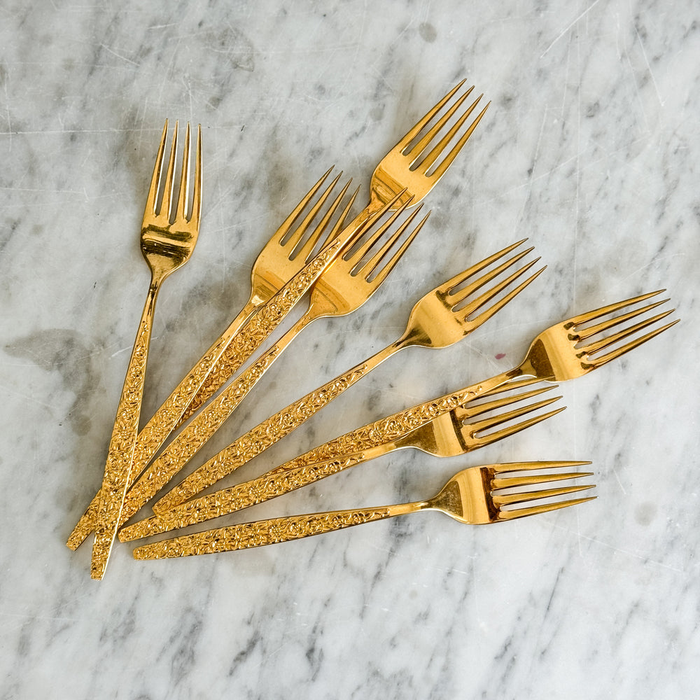 Vintage Set of 8 Gold Forks.