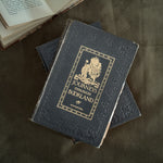 Antique black and gold books