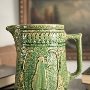 Vintage green McCoy pottery pitcher.