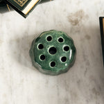 Vintage green pottery flower frog.