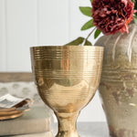 Vintage brass footed goblet vase