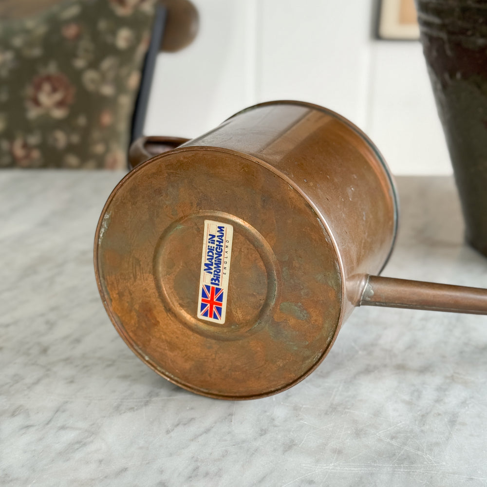 Vintage copper English watering can.