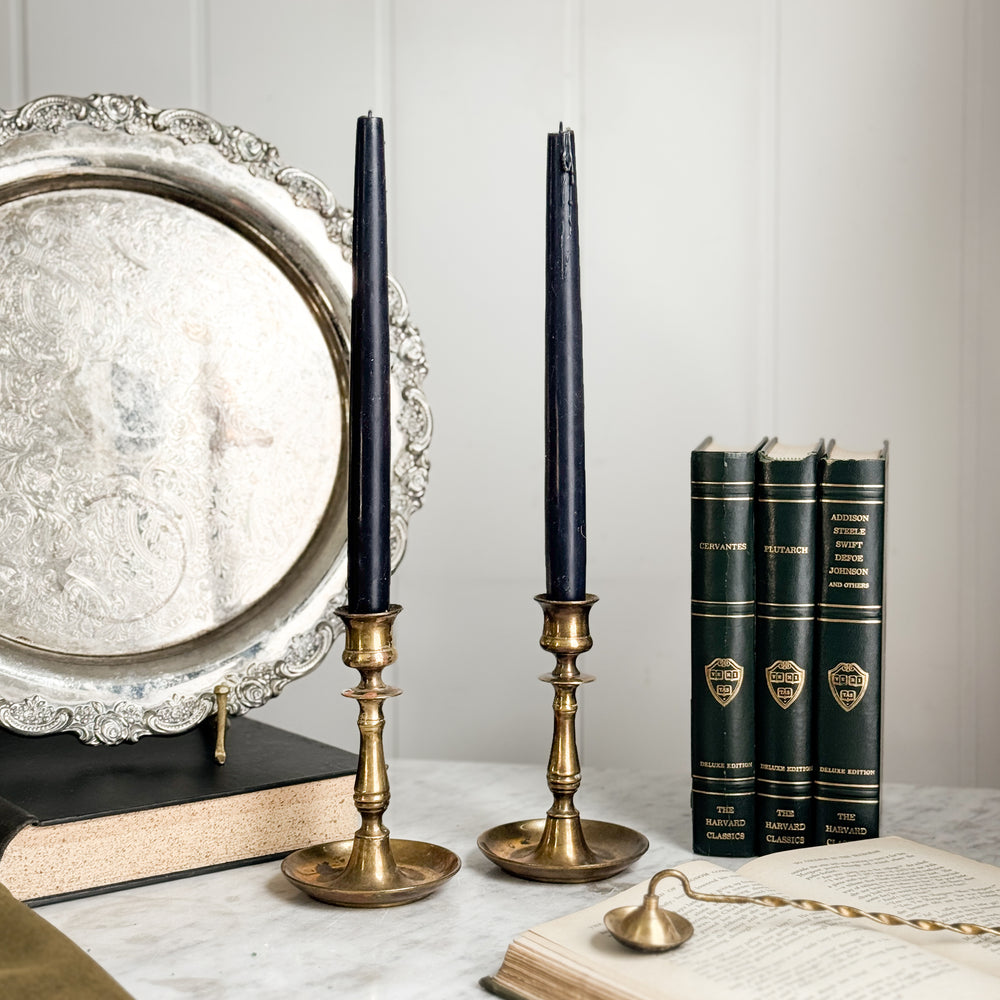 Vintage brass taper pair.