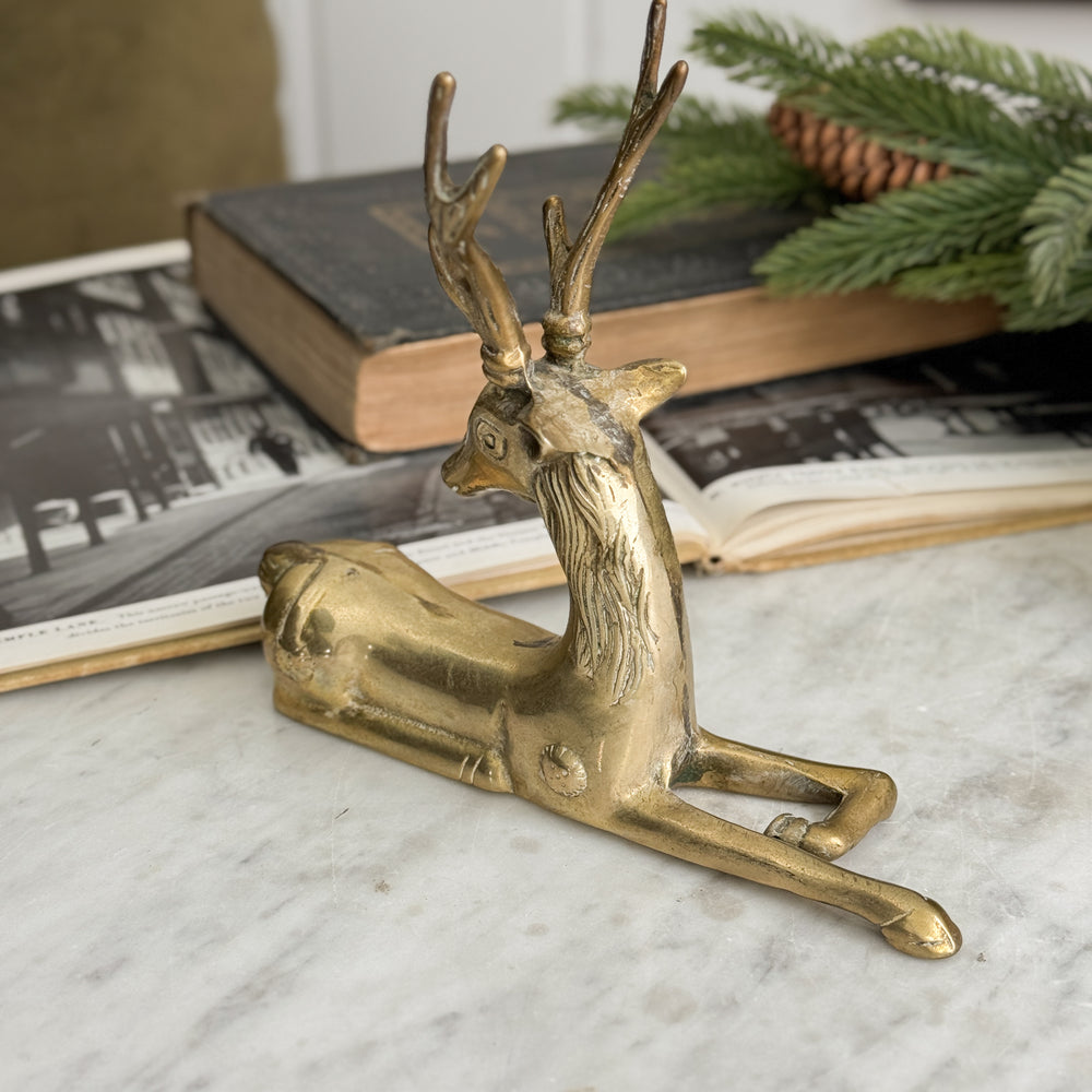 Vintage laying deer.