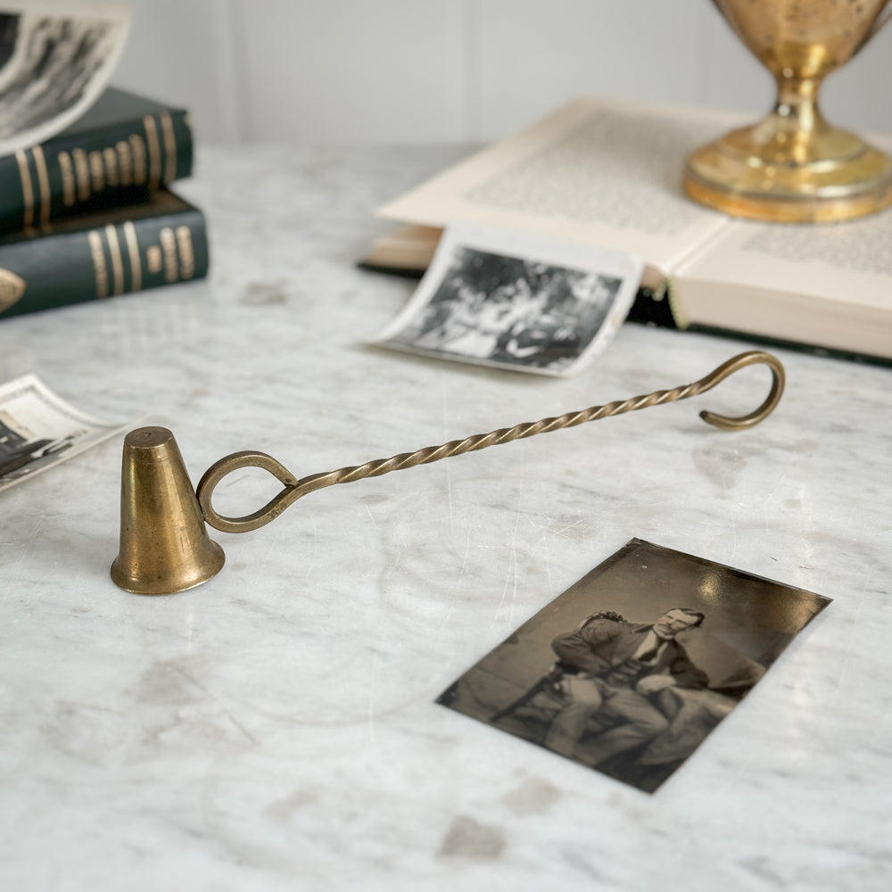 Vintage brass candle snuffer