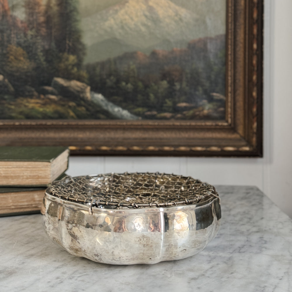 Vintage silverplate flower frog.