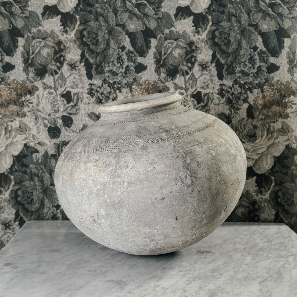 Vintage black clay mud pot