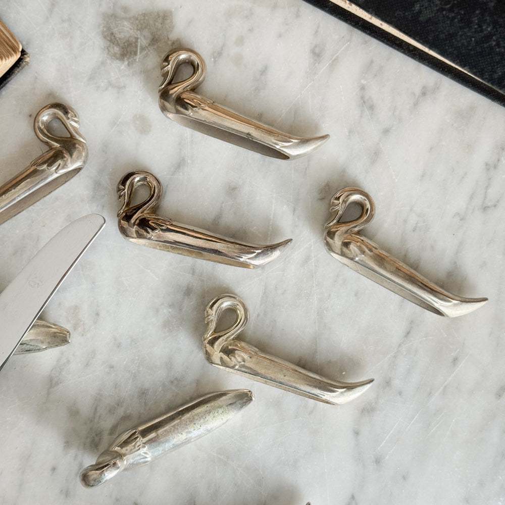 Vintage s/8 swan knife rests.