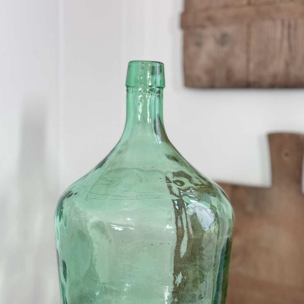 Vintage green European demijohn