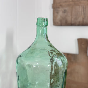 Vintage green European demijohn