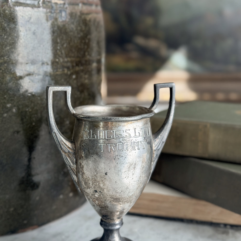 Vintage Clogg's Ltd trophy.