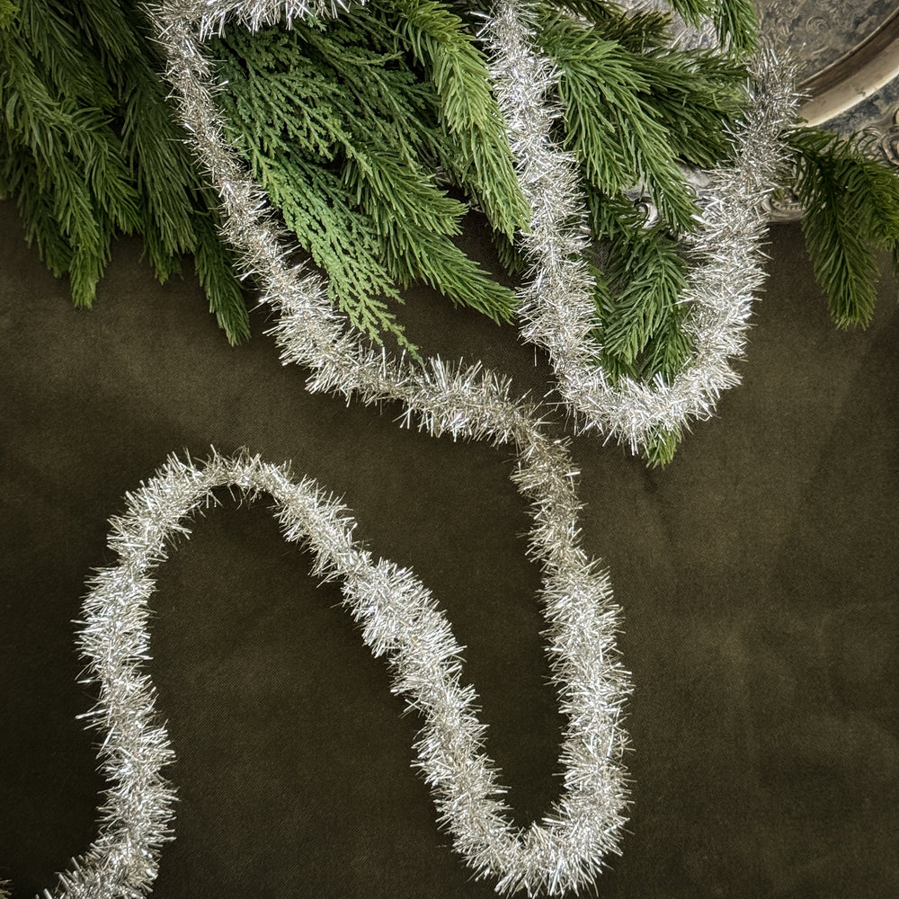 Vintage style silver tinsel garland.