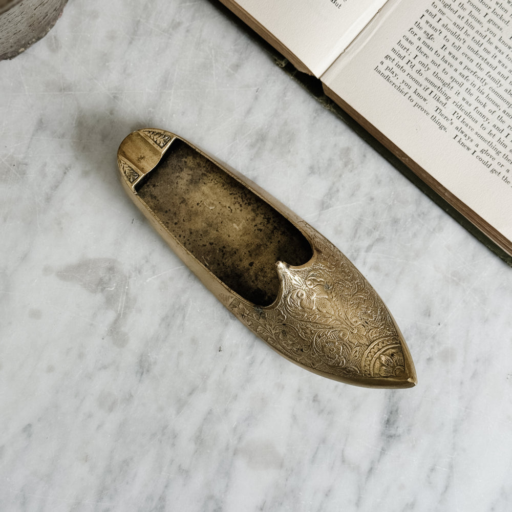 Vintage brass shoe ashtray.