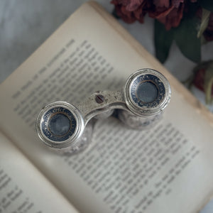 Vintage bird embossed opera glasses.