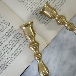 Vintage brass pair slim candlesticks.