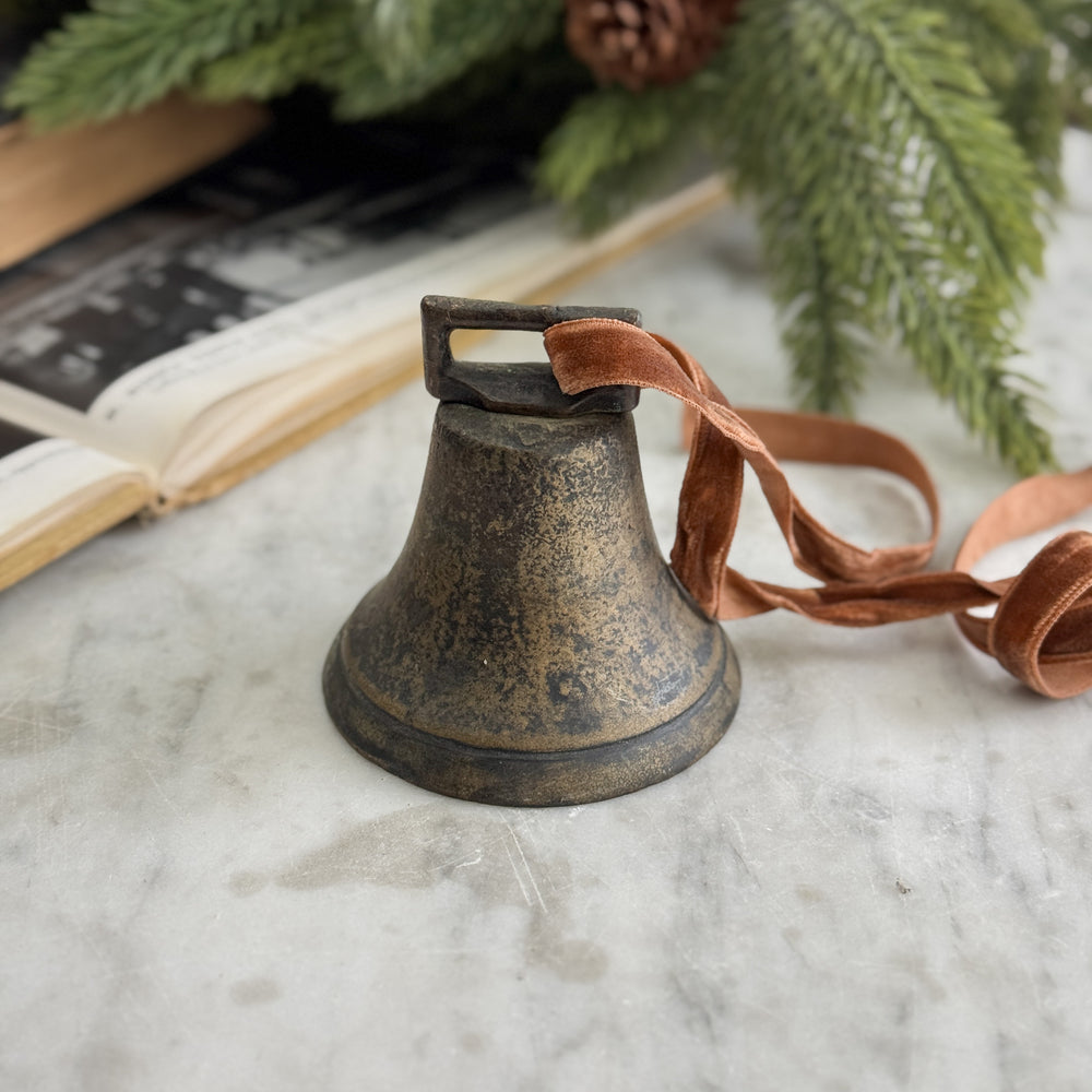 Vintage brass cow bell.