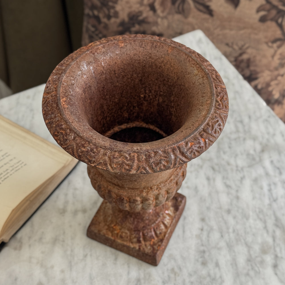 Vintage cast iron flower urn.