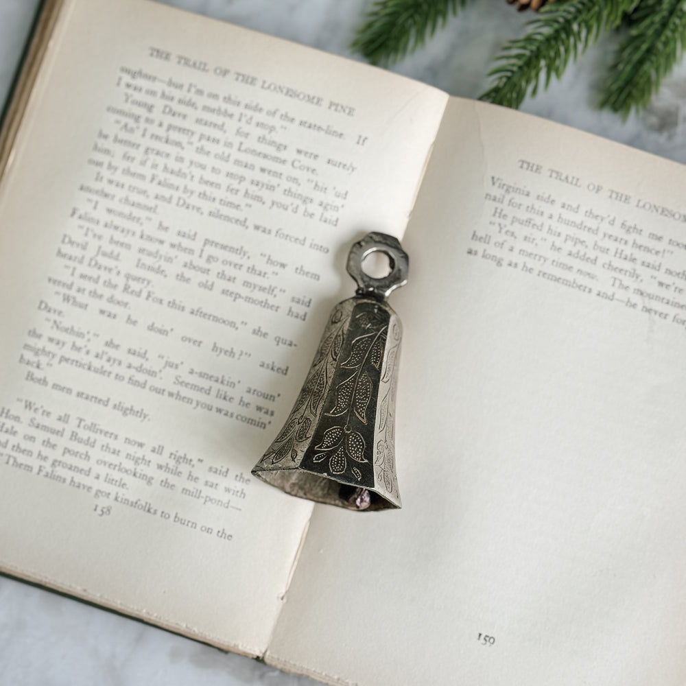 Vintage brass silver tone bell.