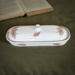Antique brown ironstone toothbrush holder.