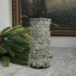 Vintage style silver tinsel garland.