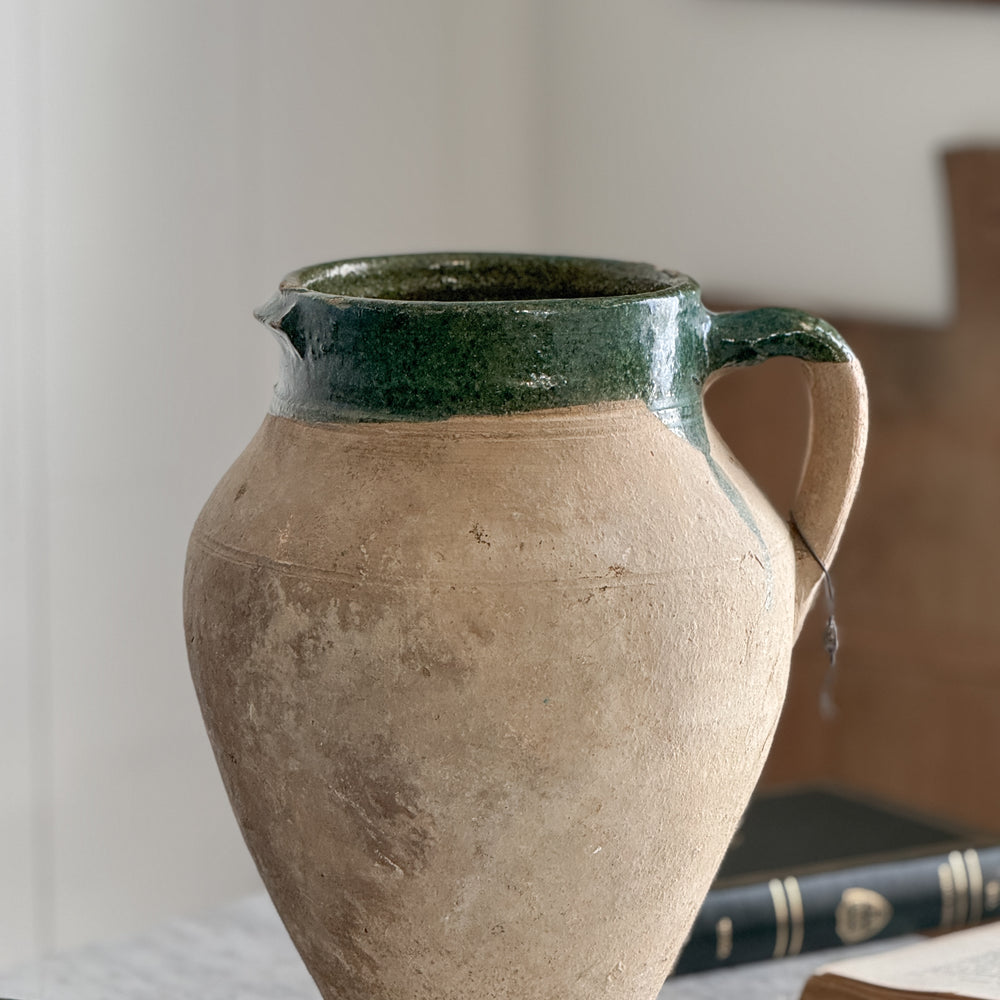 Vintage medium green olive jar.