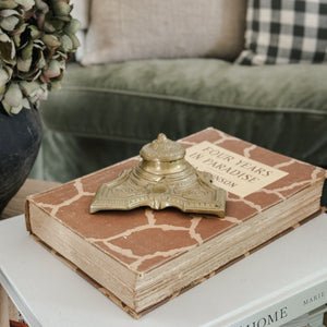 Vintage brass inkwell.