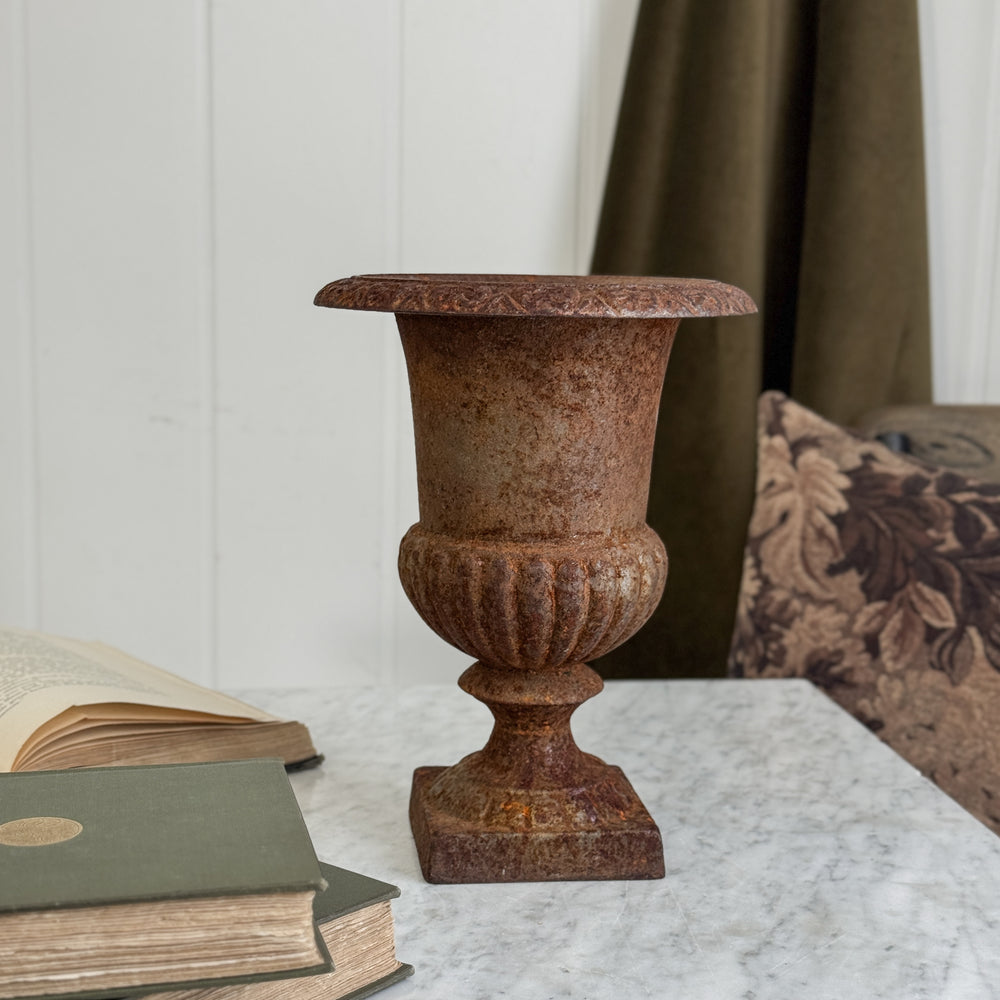 Vintage cast iron flower urn.