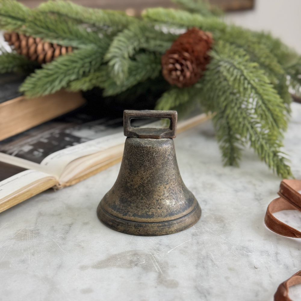 Vintage brass cow bell.