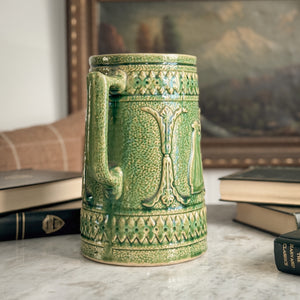 Vintage green McCoy pottery pitcher.