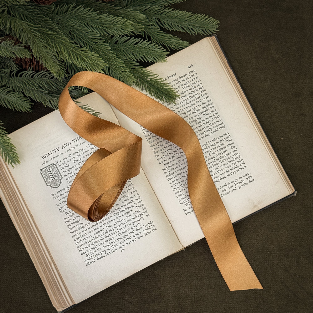 Antiqued gold satin ribbon.