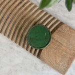 Vintage green metal tin