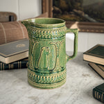 Vintage green McCoy pottery pitcher.
