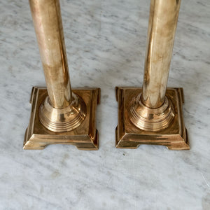 Vintage large brass taper pair.