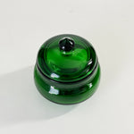 Vintage green glass dish with lid.