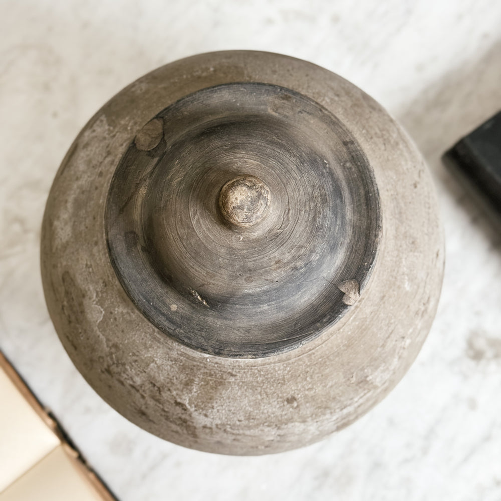 Vintage black pottery vase w/lid.