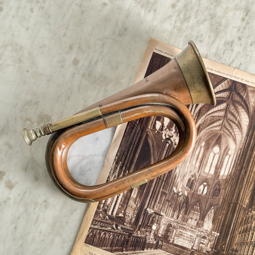 Antique copper bugle.