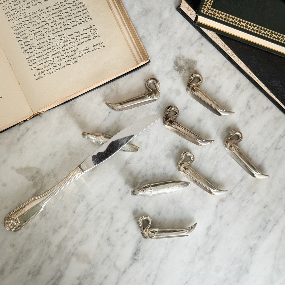 Vintage s/8 swan knife rests.