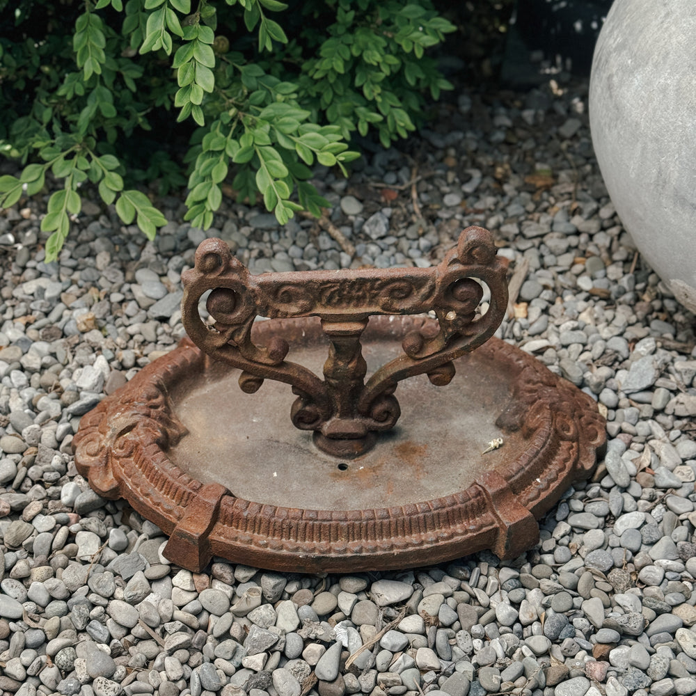 Vintage cast iron boot scraper
