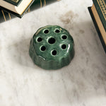 Vintage green pottery flower frog.
