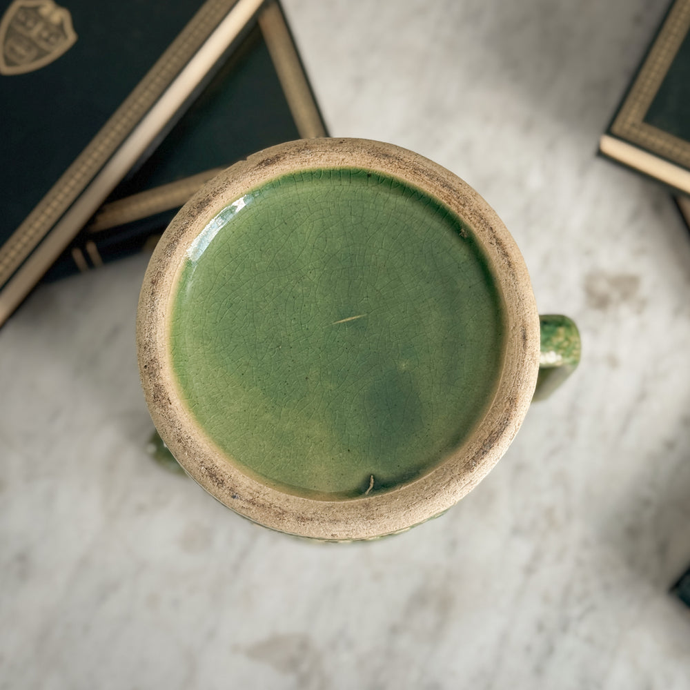 Vintage green McCoy pottery pitcher.