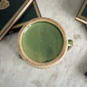 Vintage green McCoy pottery pitcher.