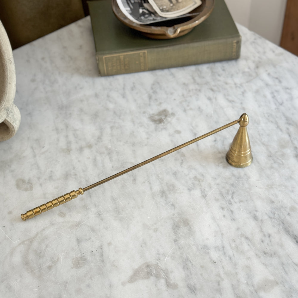 Vintage brass snuffer triangle head.