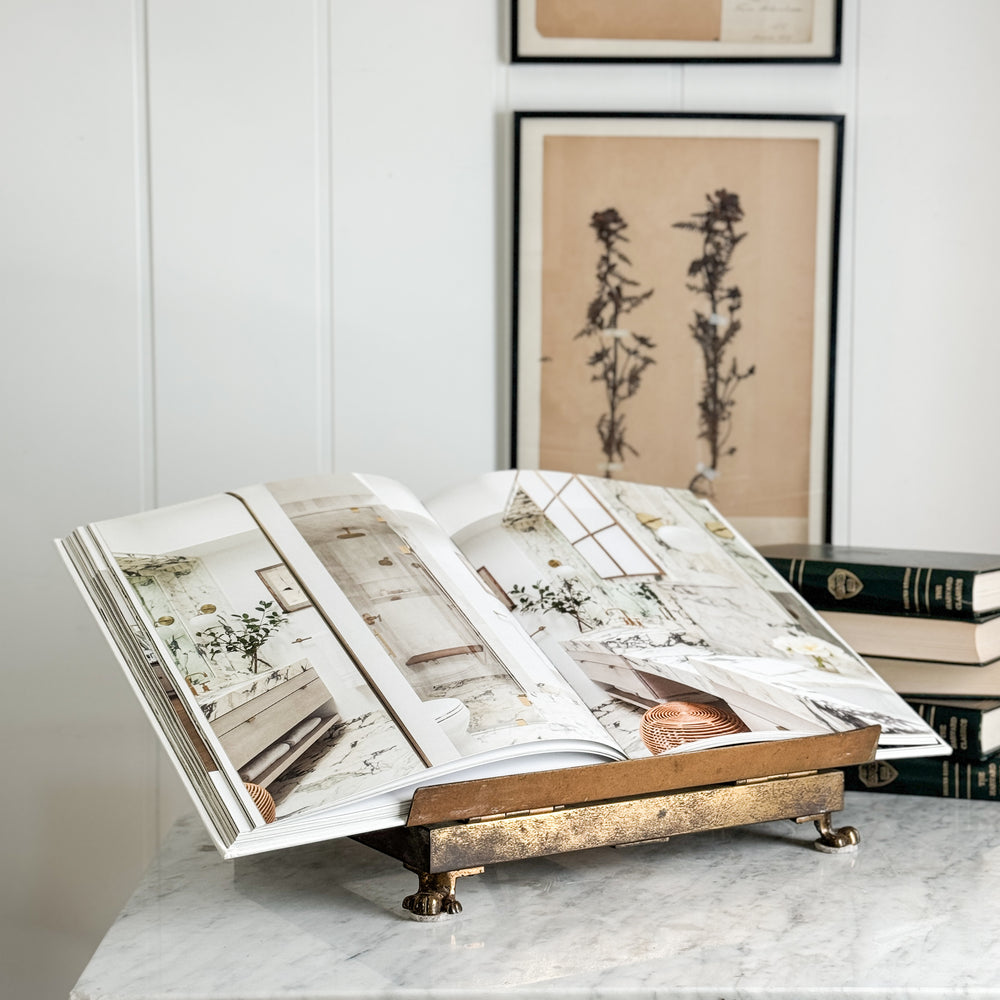 Vintage brass book display.
