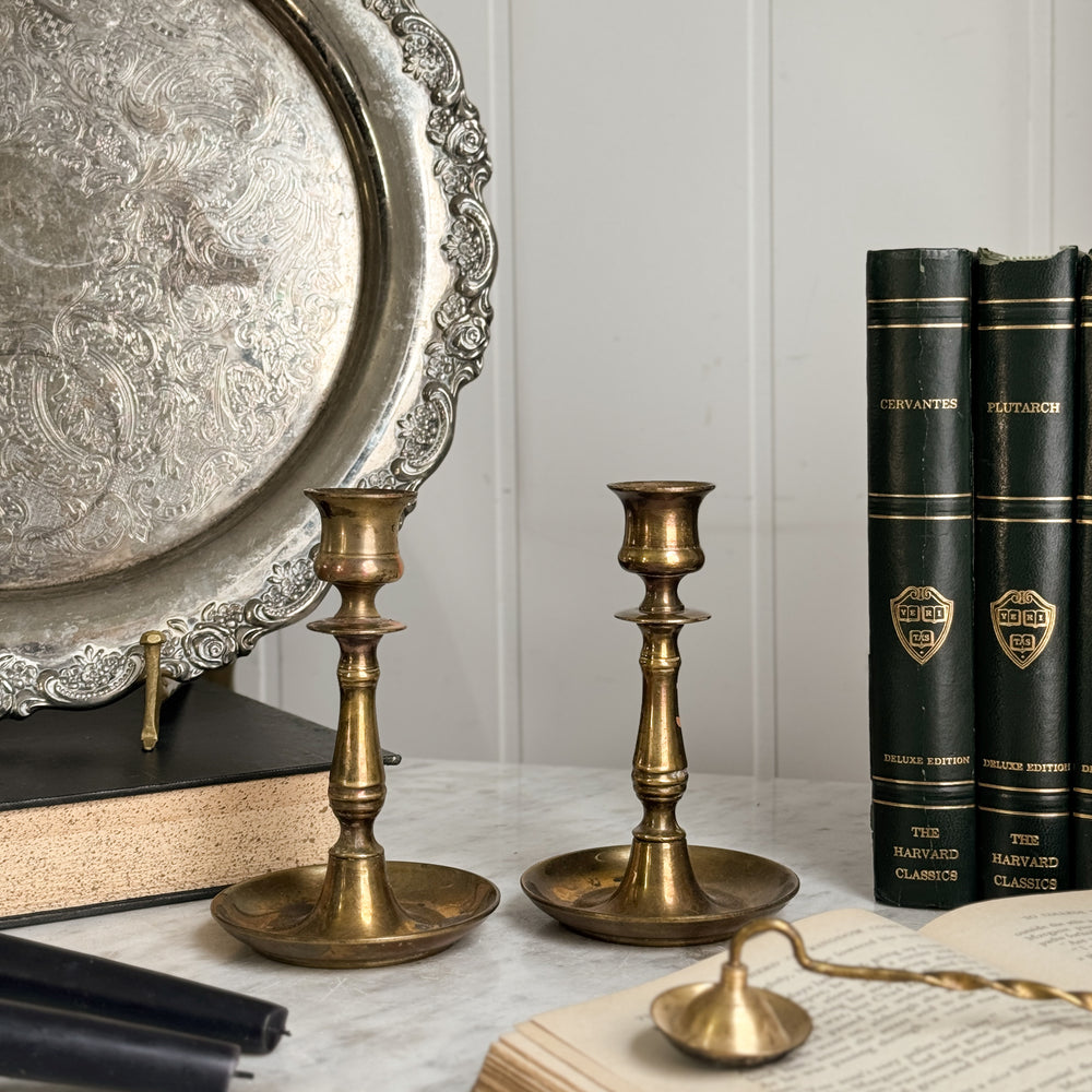 Vintage brass taper pair.